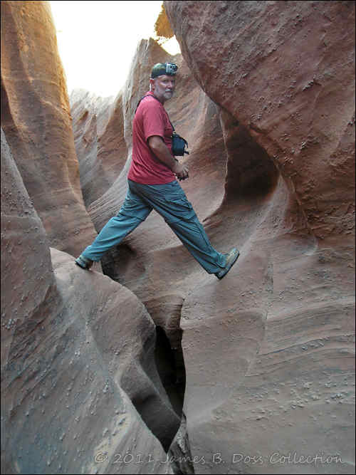 Exploring. Jim Doss exploring a slot canyon in Grand Staircase-Escalante National Monument, Utah.